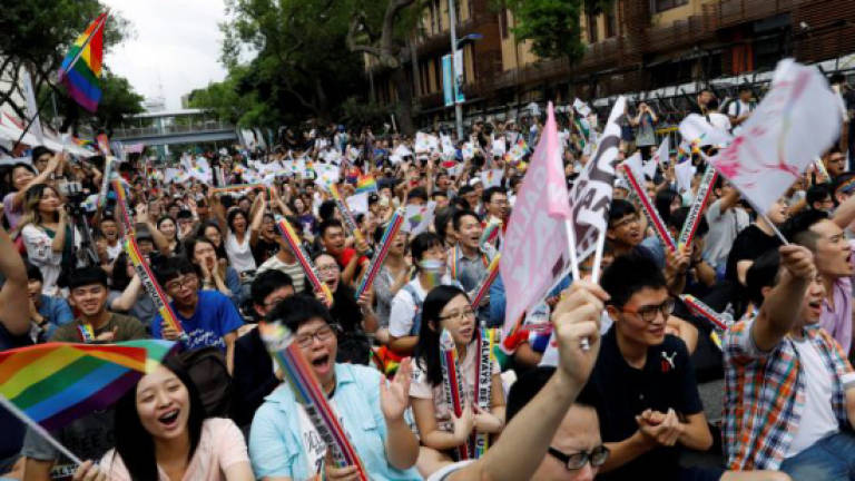 Taiwan same-sex marriage ruling brightens outlook for gay rights in China
