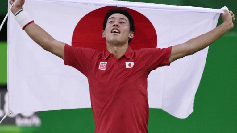 Nishikori beats Nadal, ends Japan's 96-year wait