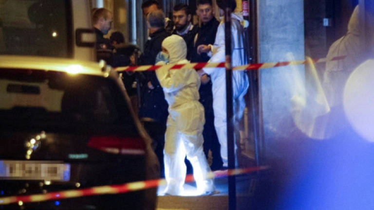 Police probe Chechen-born knifeman in bloody Paris attack