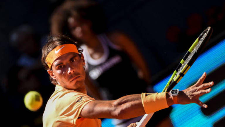Nadal, Murray through in Madrid