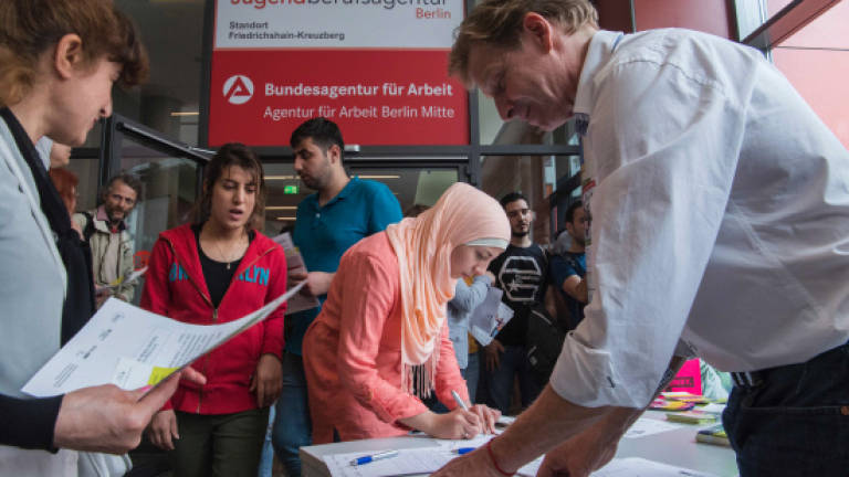 Refugees draw fear, anger and generosity from Berlin voters