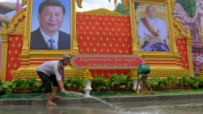 Cambodia embraces China's President Xi on state visit