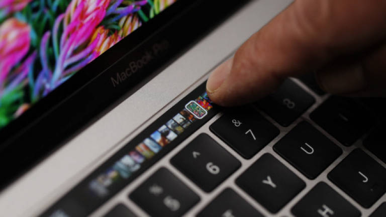 Apple ramps up MacBook infused with touch controls