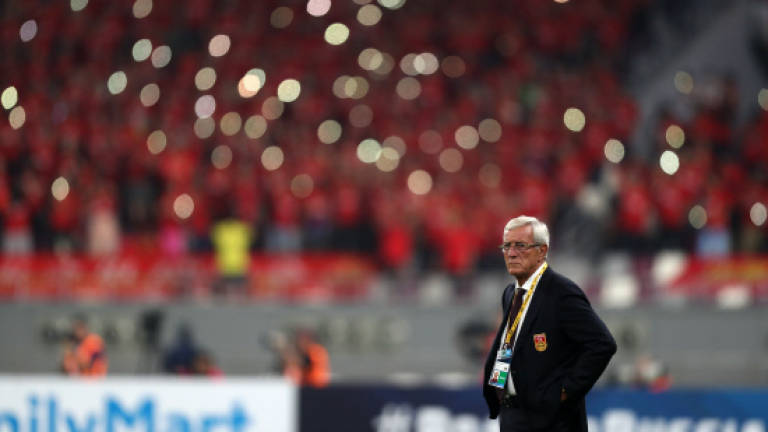 China dare to believe despite World Cup exit