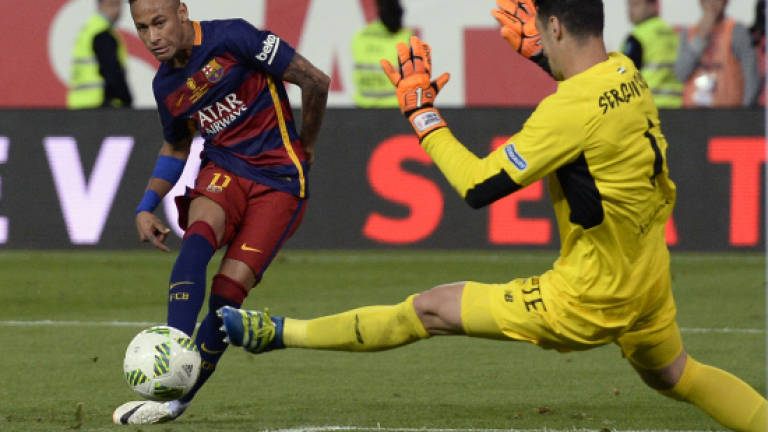 Barcelona edge out Sevilla in bad-tempered Cup final