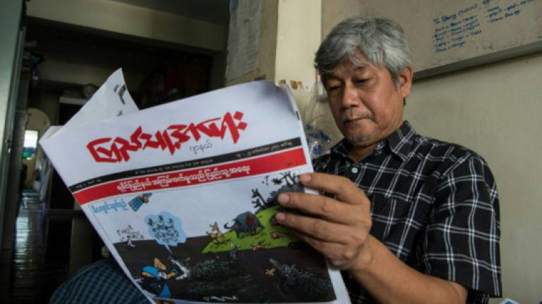 Myanmar cartoonists lead media-jeering as Rohingya flee