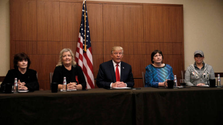 Trump convenes meeting of Bill Clinton accusers ahead of debate