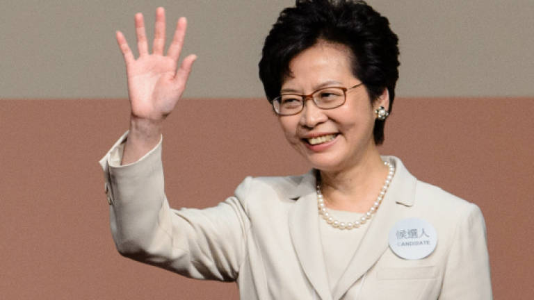 Hong Kong's divisive new leader faces tough task