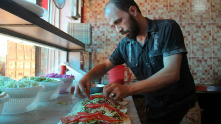 Uprooted entrepreneurs form 'Little Damascus' in northwest Syria