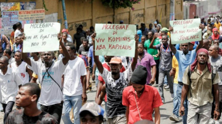 Marchers demand Haiti's president step down