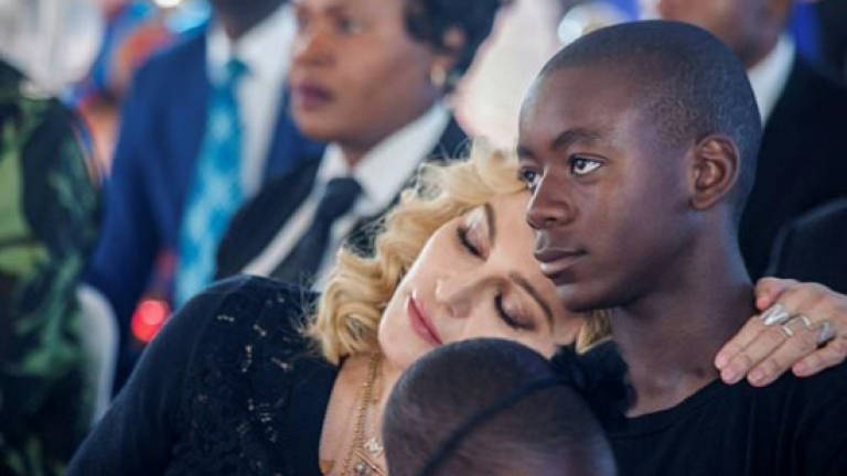 Madonna moves to Lisbon to help son David become a football star