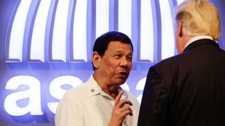 Philippines' Duterte explains gum-chewing habit