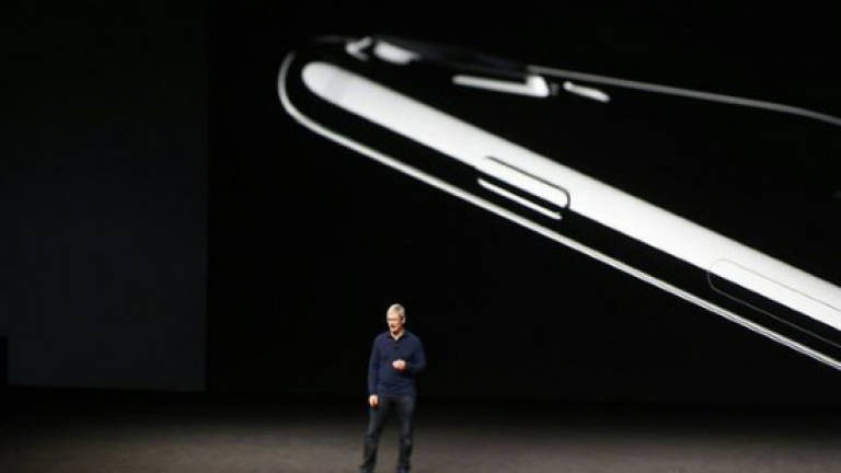 Apple out to renew iPhone frenzy at age 10