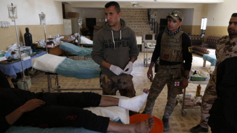 In Iraq's Mosul, a school becomes a field hospital