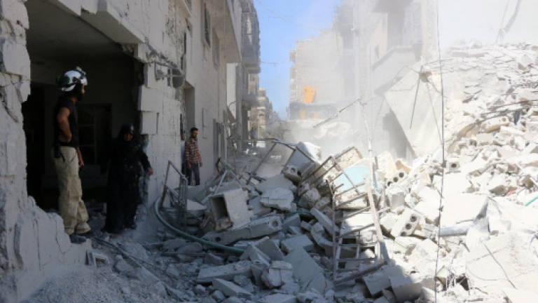 Dozens dead as warplanes pound rebel-held north Syria