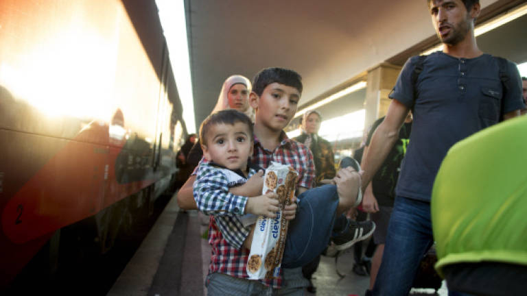 Austria smuggler crackdown as Europe divided over migrant crisis