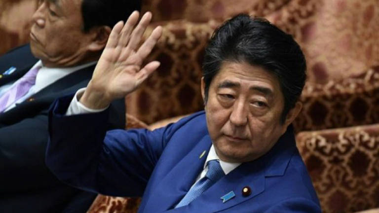 Japanese nationalist claims cash from Abe as scandal deepens