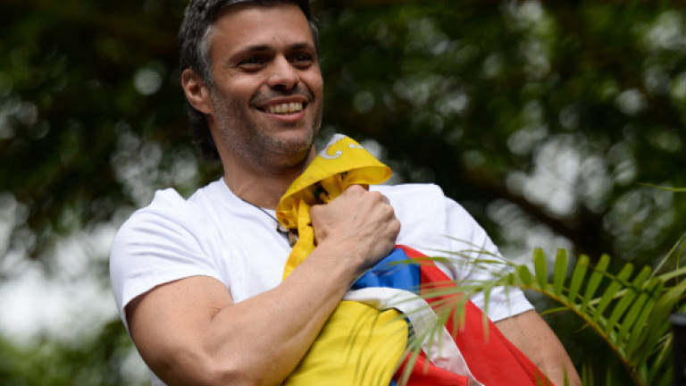 Venezuela opposition leader Lopez released to house arrest