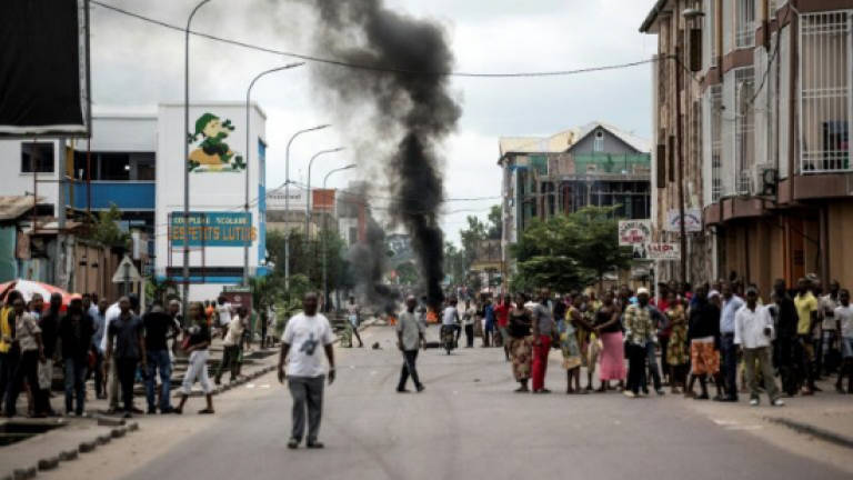 One killed as DR Congo police fire on banned protests