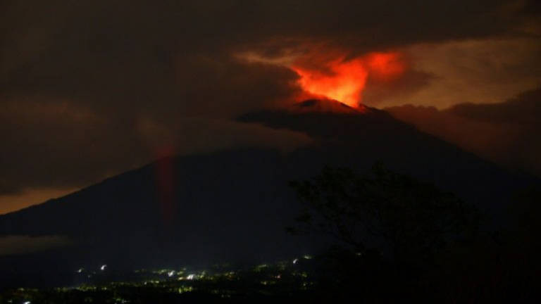 Living in the shadow of Bali's volcano, refusing to leave Living in the shadow of Bali's volcano, refusing to leave