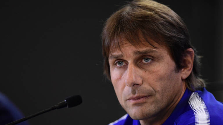 Conte challenges Chelsea to make Champions League step up