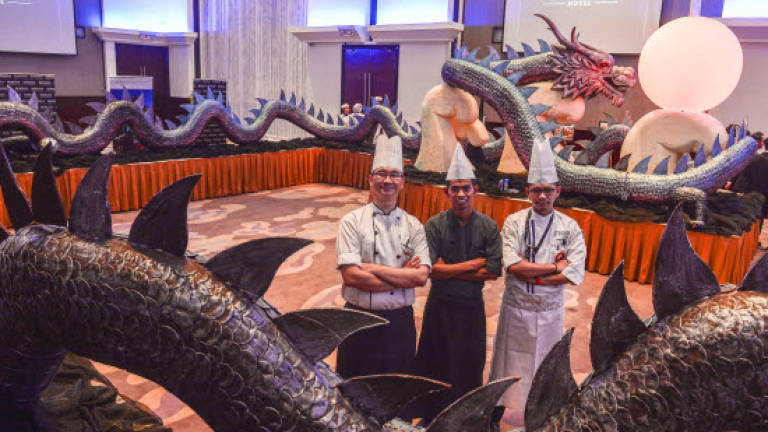 A magnificient dragon cake for Berjaya's dragon founder A magnificient dragon cake for Berjaya's dragon founder