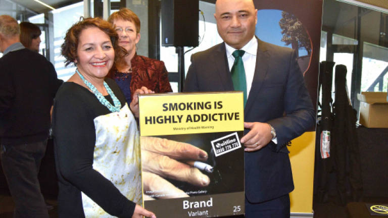 New Zealand backs plain packaging for cigarettes