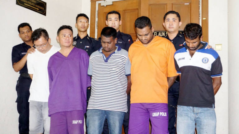Seven people charged in connection with fatal shooting of property agent at Taman OUG