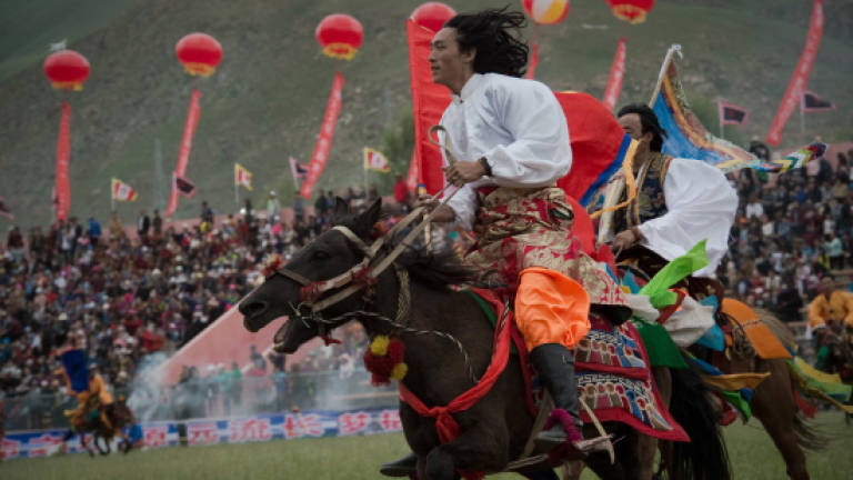 Riders on the plateau: Tibetans gather for horse festival