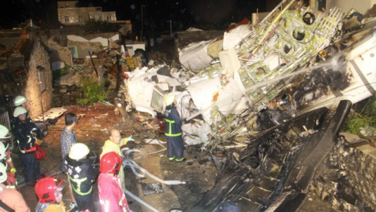More than 40 dead in Taiwan plane crash