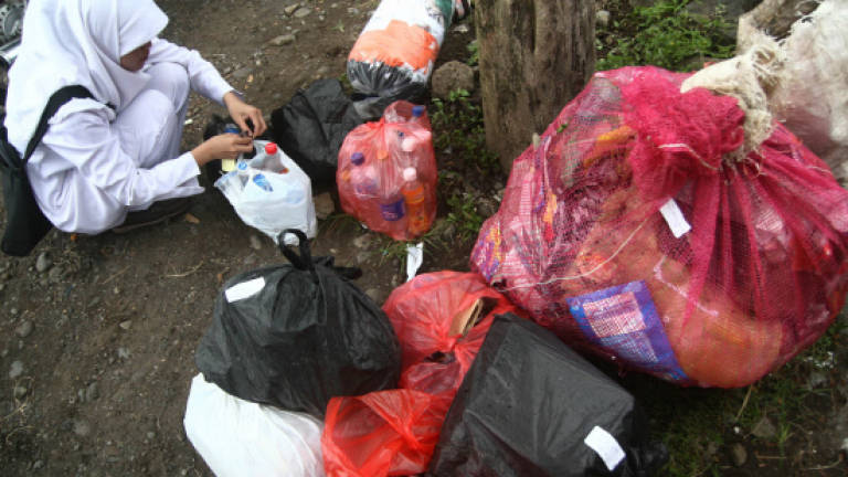 Indonesia's poor swap garbage for health care