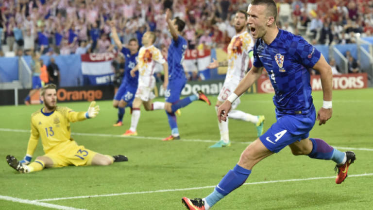 Croatia fightback condemns Spain to unwanted Italy clash