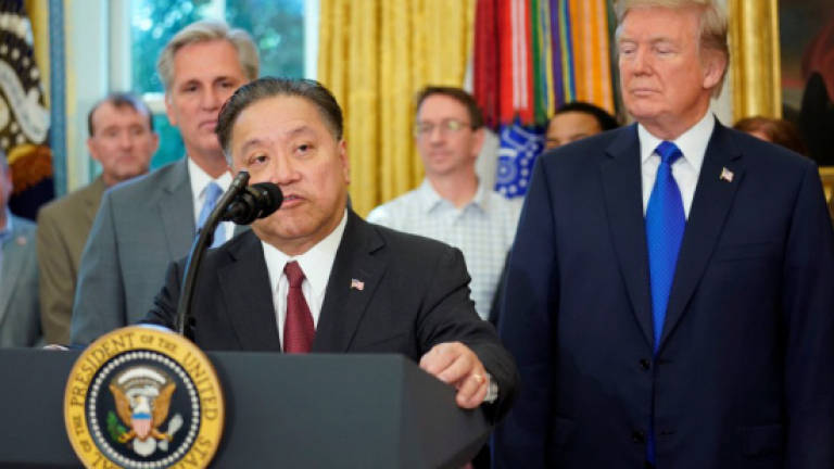 Trump warmly welcomes Penangite to White House after Broadcom relocation news