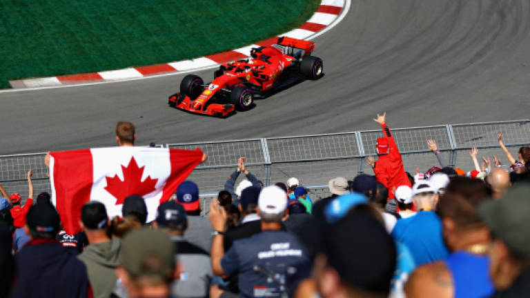 Vettel and Raikkonen subdued after difficult day for Ferrari