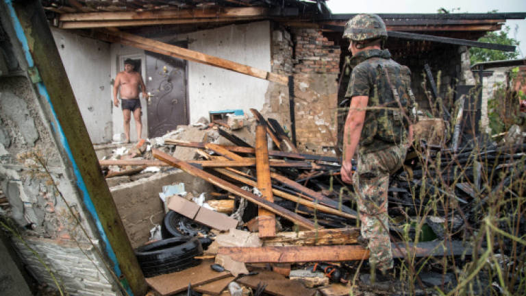 Ten killed in spike in east Ukraine violence