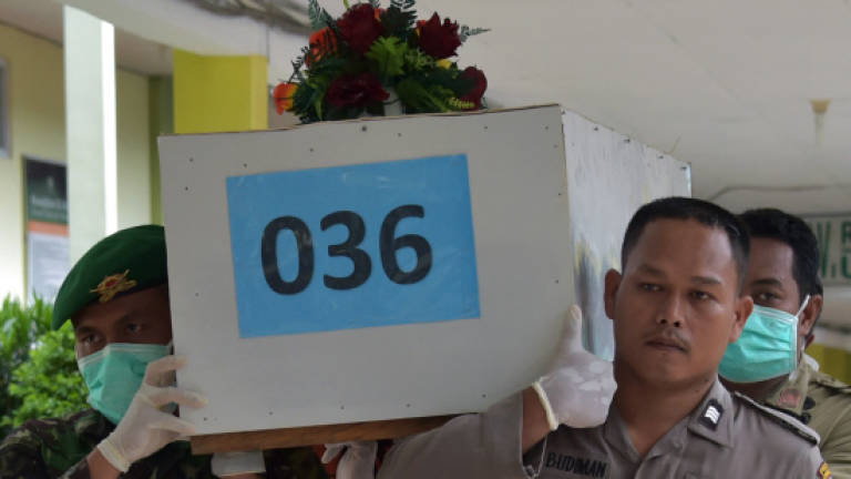 QZ8501: Three more victims identified
