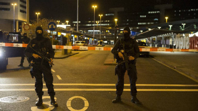 Amsterdam airport partly evacuated in security alert, man detained