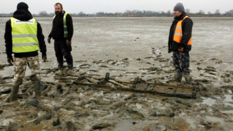 WWII Soviet bomber parts found in lake near Auschwitz