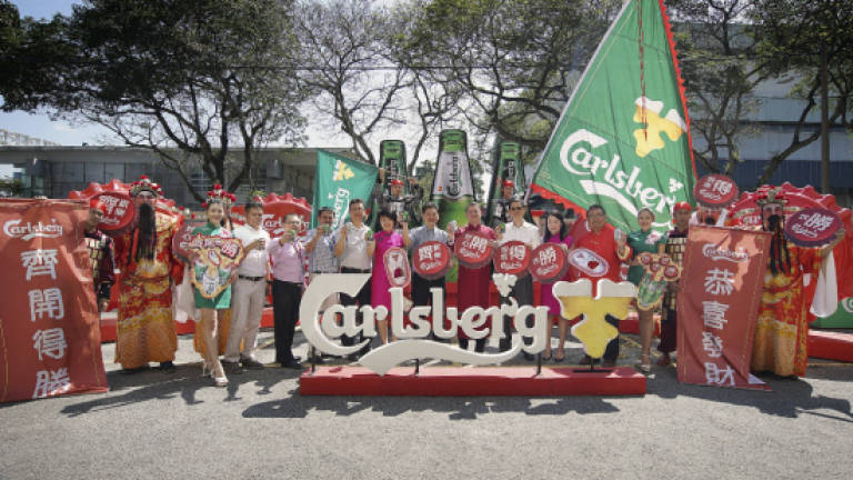 Carlsberg visits theSun office to usher in CNY