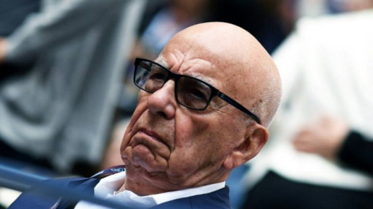 Rupert Murdoch recovering from back injury