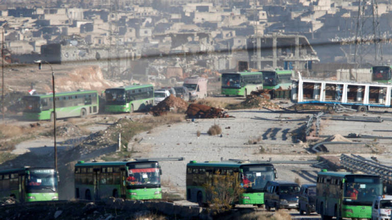 Gunmen attack buses sent to evacuate Syria pro-regime villages