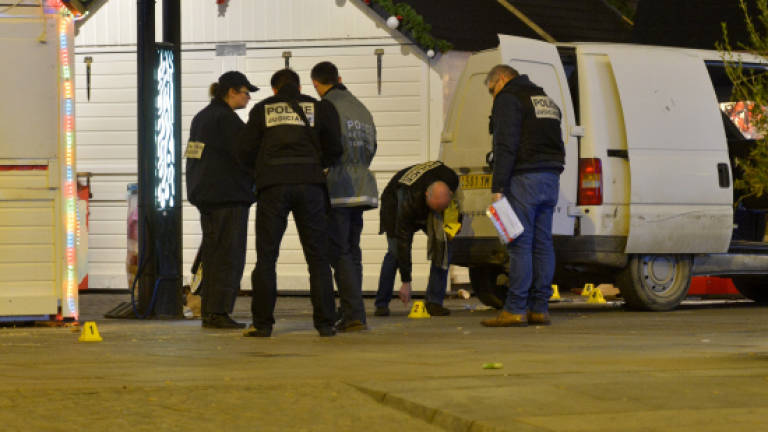 Ten injured as attacker rams van into French Christmas market