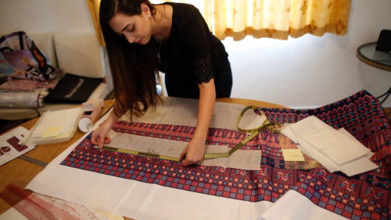 Palestinian fashion designer breathes new life into tradition