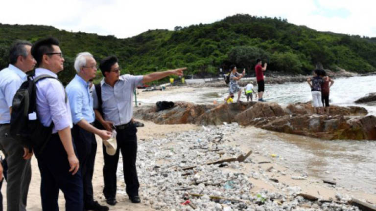 Hong Kong cleans up 93 tonnes of palm oil, shuts 13 beaches after huge spill