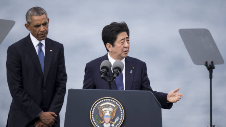 Abe, Obama hail reconciliation at Pearl Harbour