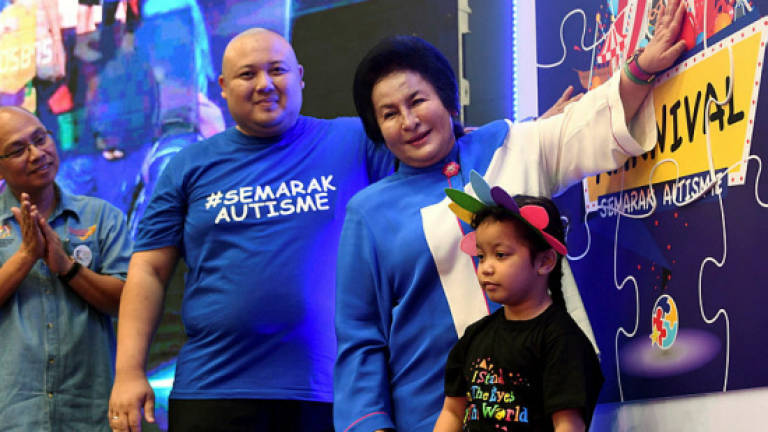 Najib, Rosmah spend time with guests at autism carnival