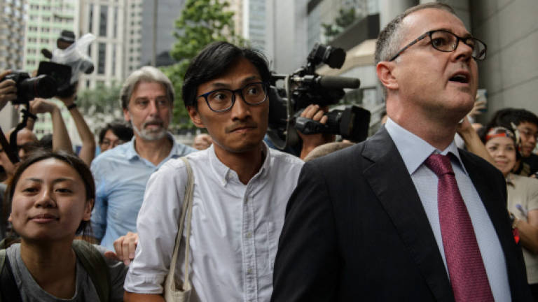 Hong Kong arrests 2,000 in triad raids