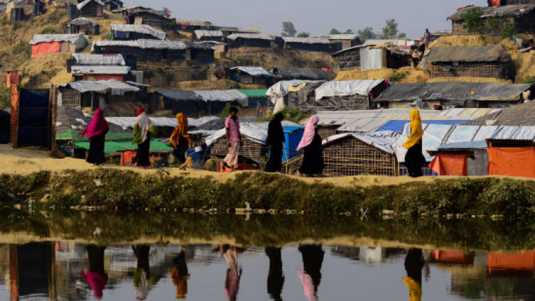 Village burns in Myanmar's Rakhine state: Bangladesh official