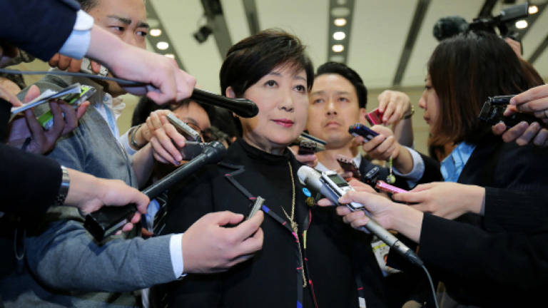 Japan's Koike steps down as party head (Updated)