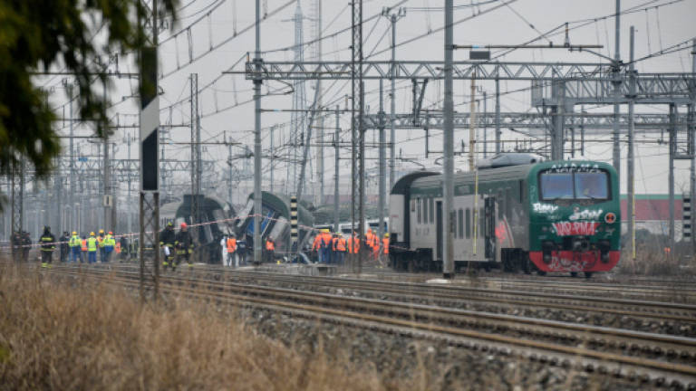Three dead, scores injured as train derails in Italy
